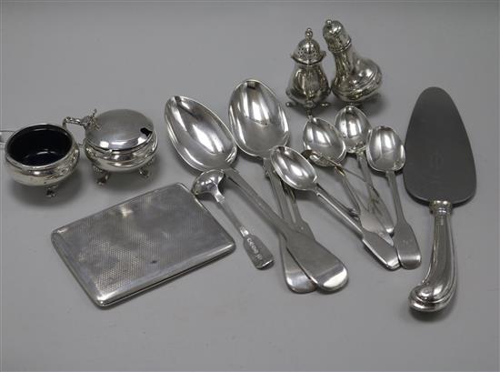 Ten items of assorted silver flatware, four silver condiments and a silver cigarette case.